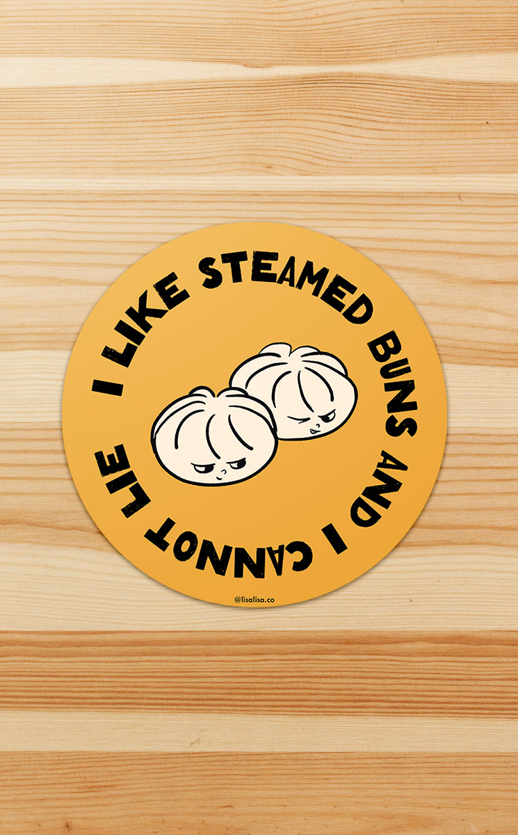 Two siopao buns looking at each other mischievously, surrounded by the phrase "I like steamed buns and I cannot lie"